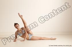 Swimsuit Gymnastic poses Woman White Moving poses Slim long brown Dynamic poses Academic